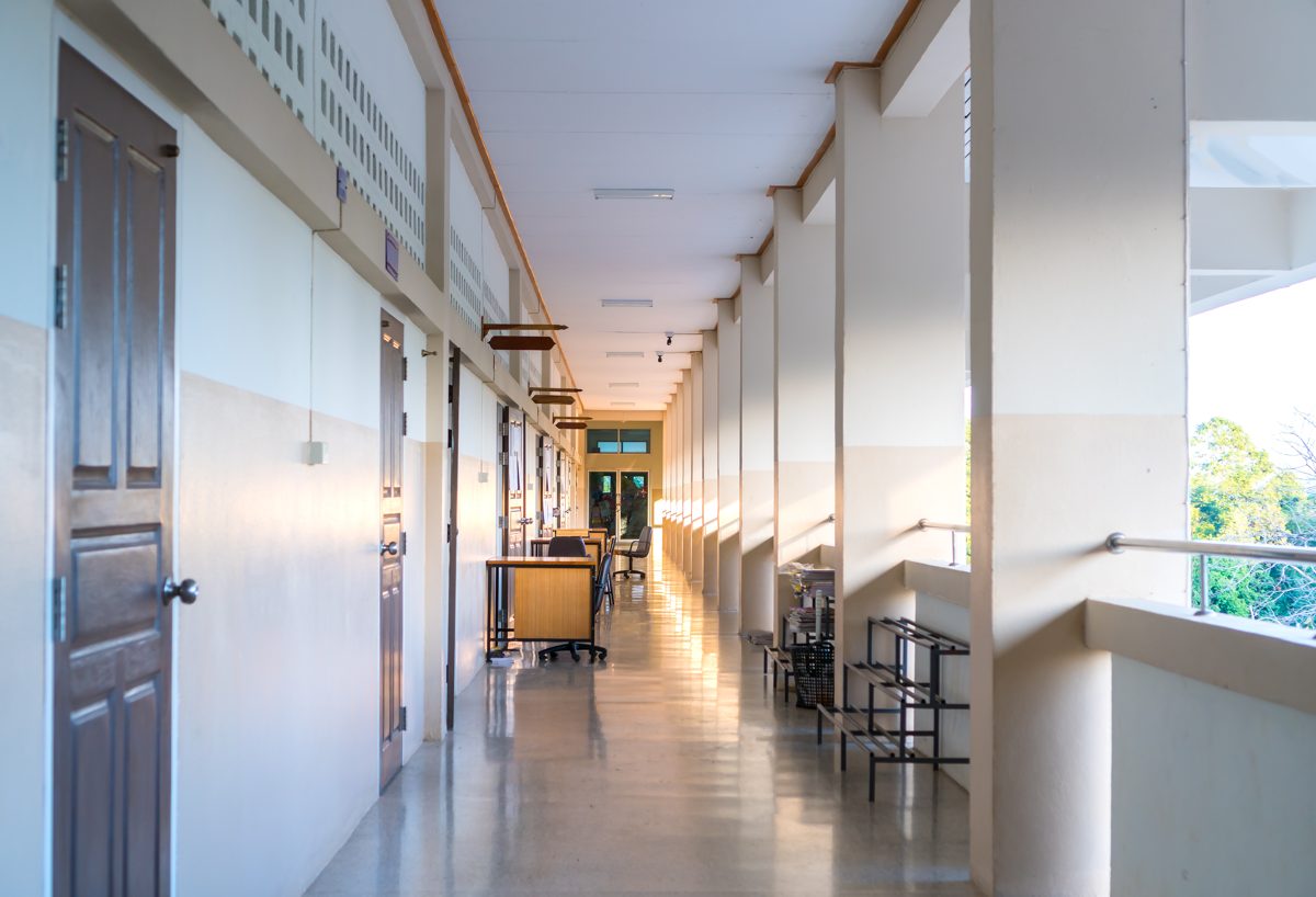 School corridor with public-address announcements